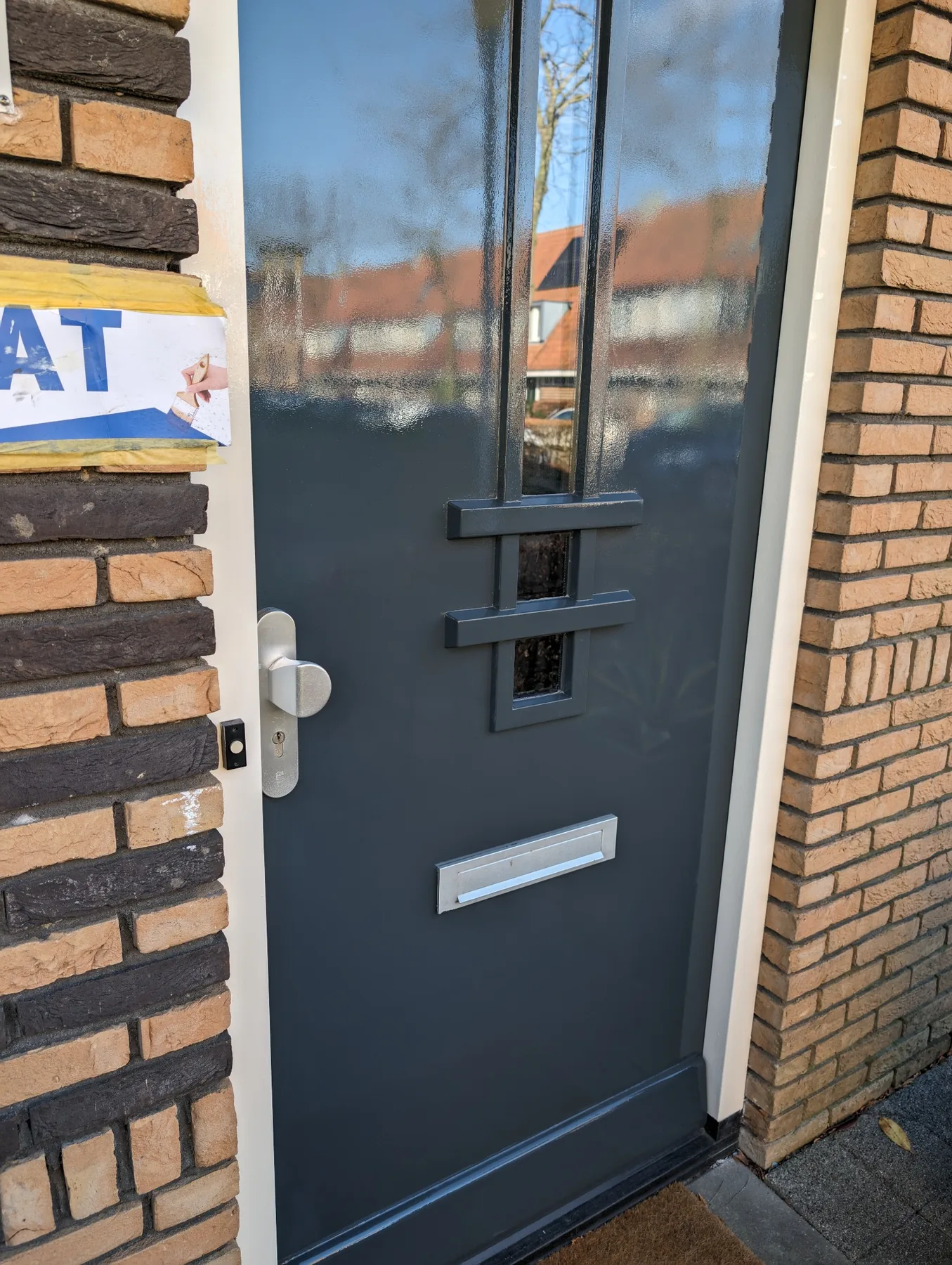 Voordeur in hoogglans